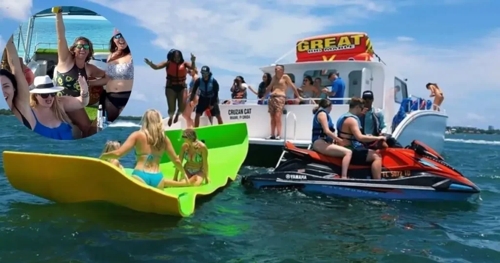 Friends smiling and having fun on a party boat in Miami with a jet ski and a banana boat in the water