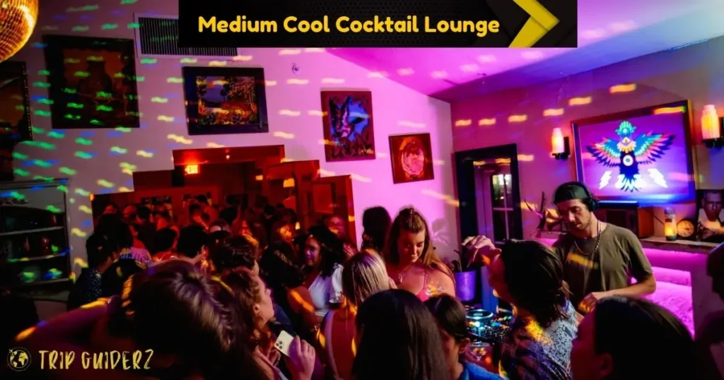 A sophisticated bartender at Medium Cool Cocktail Lounge in Miami Beach, showcasing a great indoor spot for a stylish night out