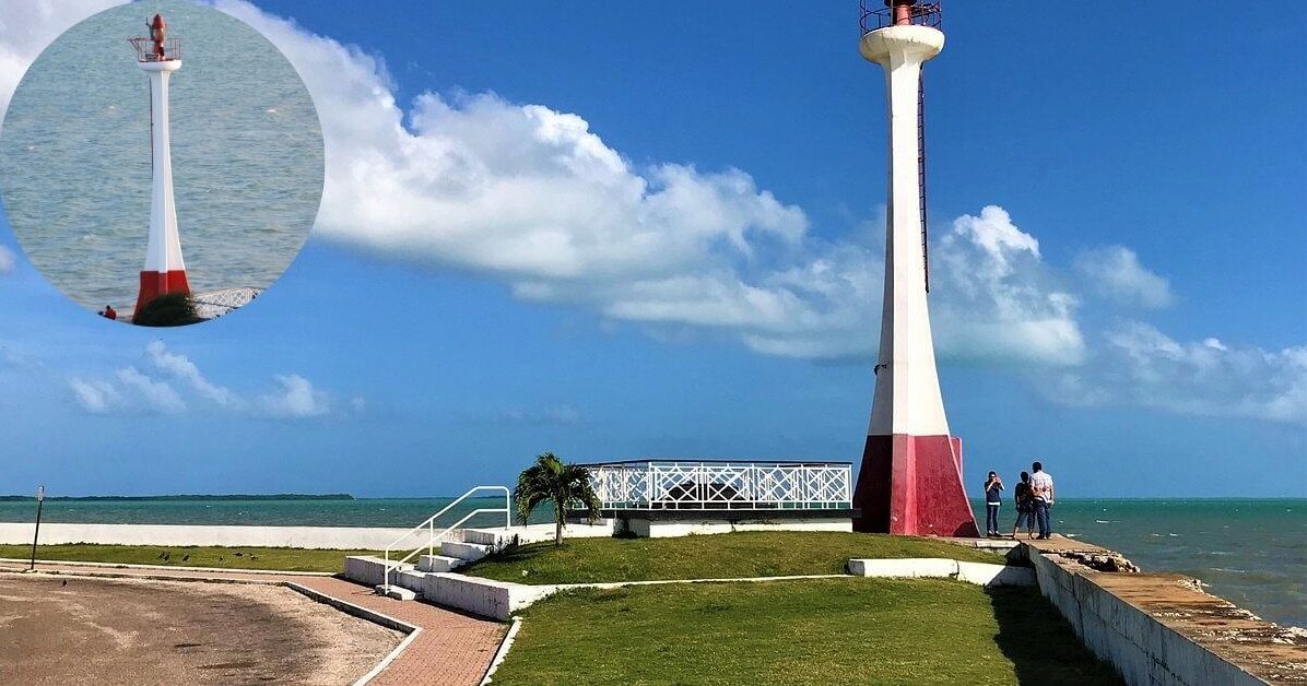 The red and white striped Baron Bliss Lighthouse standing at the edge of the water in Belize City.