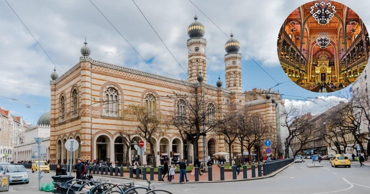 A photo of the stunning Dohány Street Synagogue in Budapest, showing its iconic yellow and red striped facade and intricate, detailed architecture.