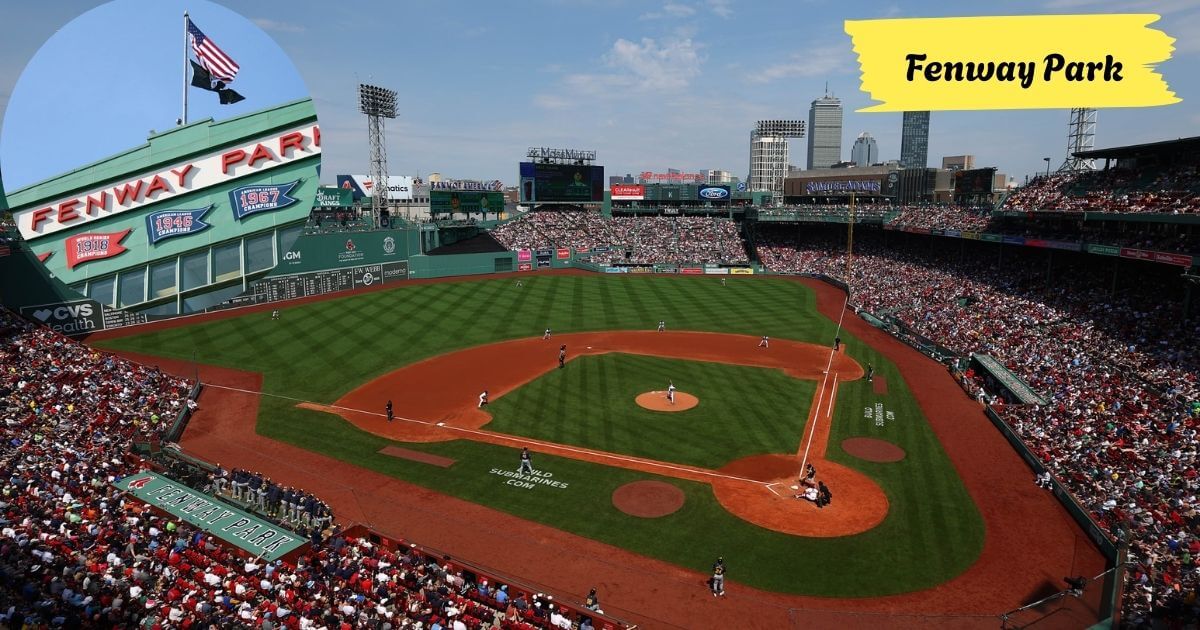 An aerial view of Fenway Park during a baseball game, showing the green field, red clay infield, and a stadium filled with fans.