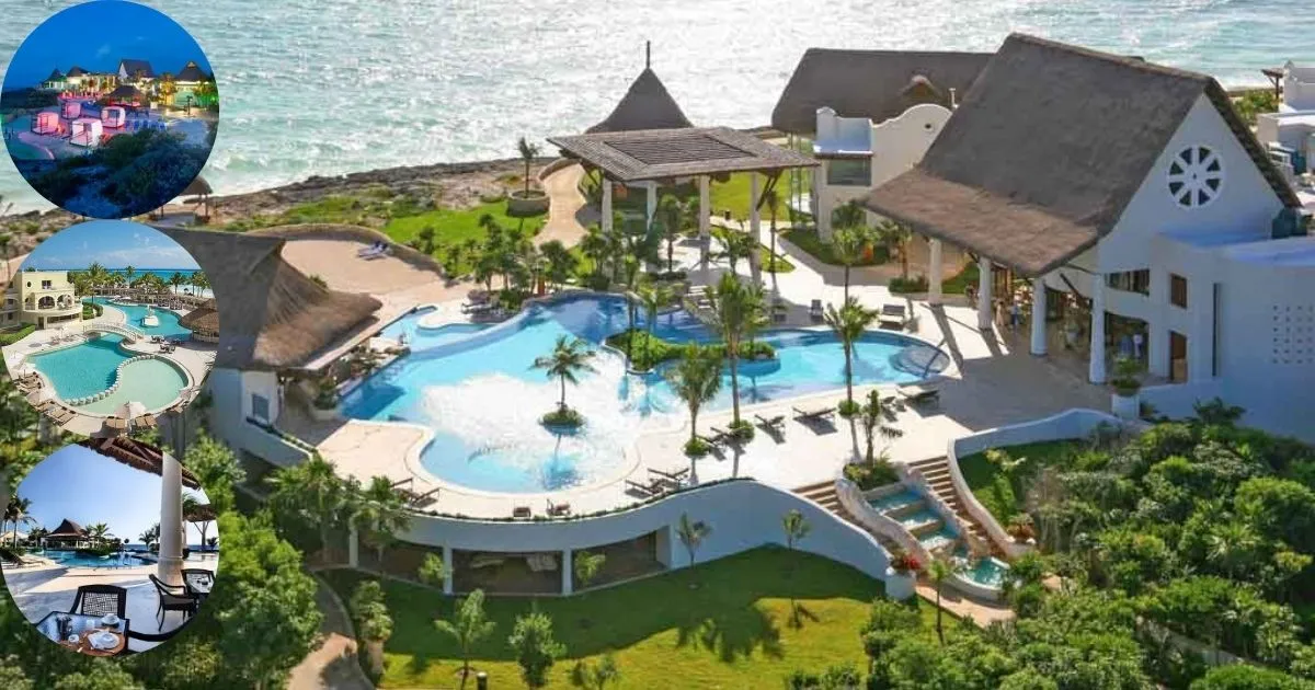 An aerial shot of the Kore Tulum Retreat and Spa Resort, highlighting the large infinity pool, lush grounds, and spacious hotel buildings with thatched roofs, located on a cliffside overlooking the sea.
