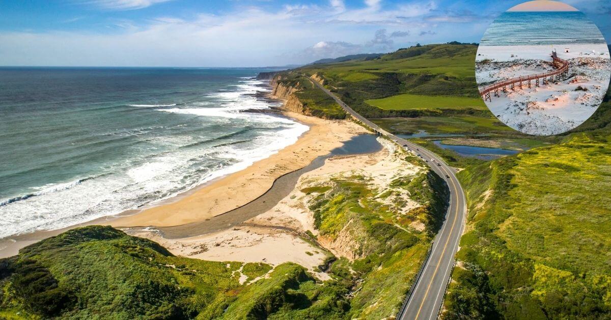 An aerial view of a scenic coastline with waves crashing on a sandy beach, a river meandering toward the ocean, and a coastal road winding through green hills. An inset shows a wooden walkway on a secluded beach.
