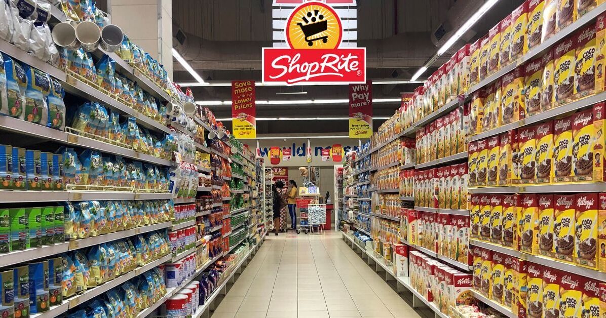 The interior of a ShopRite grocery store showing the refrigerated meat counter.
