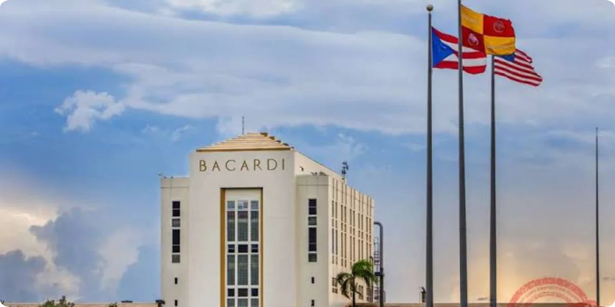 Exterior view of the Bacardi Distillery in Cataño, showcasing its iconic architecture and surrounding landscape.
