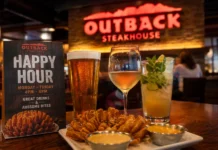 Outback Steakhouse Happy Hour | Times, Menu & Deals Outback Steakhouse happy hour with drinks, blooming onion, appetizers, and a cozy restaurant setting.