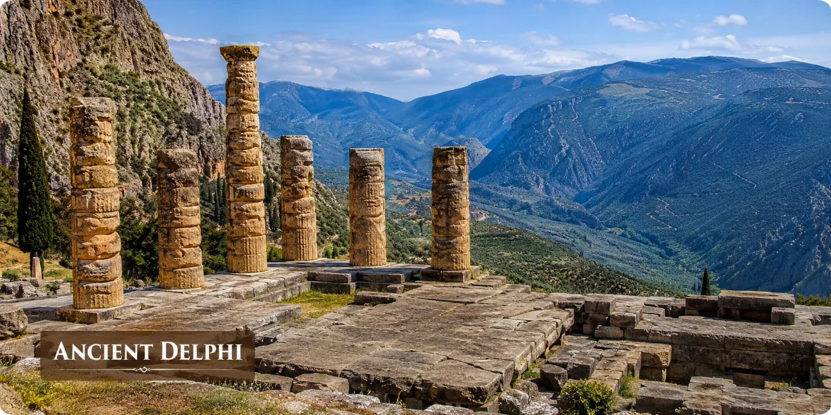 Ancient ruins of Delphi nestled in the mountains, with the phrase "ancient death" displayed prominently.