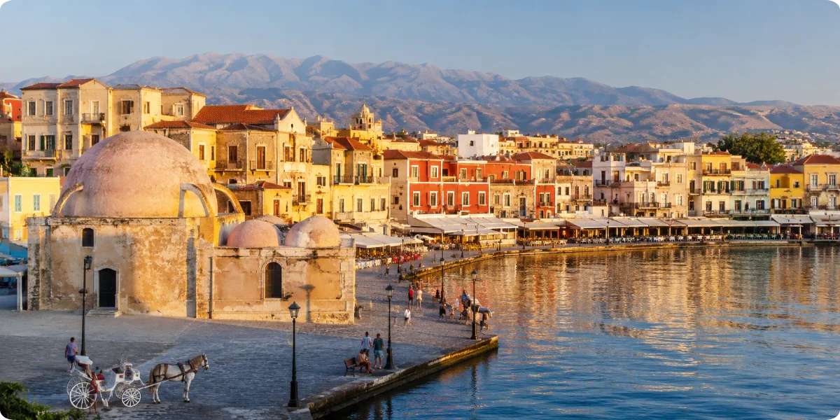 Charming streets of Chania's Old Town, featuring traditional buildings and a lively atmosphere in Greece.