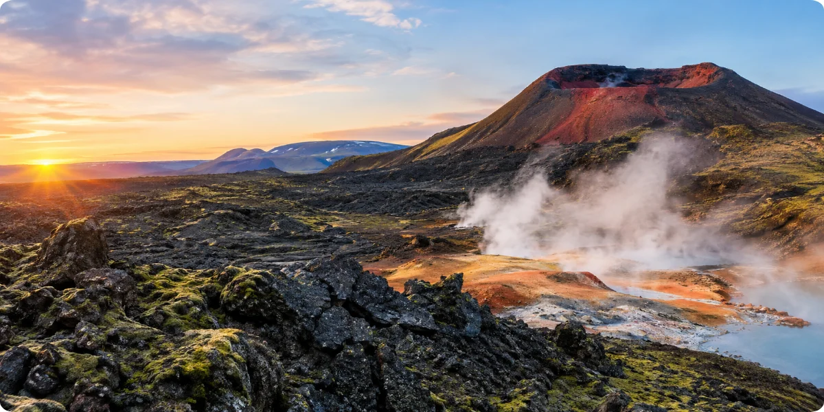 A stunning view of Iceland's volcanic landscapes, showcasing rugged terrain and dramatic geological formations.