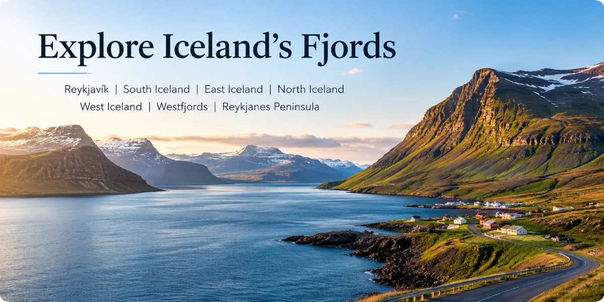 A breathtaking view of Iceland's fjords, showcasing steep cliffs and serene waters under a clear blue sky.
