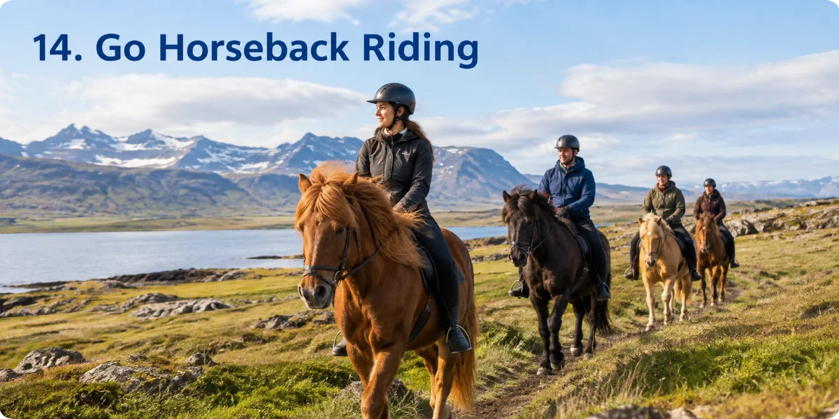 A scenic view of horseback riding in Iceland, featuring riders on horses against a backdrop of mountains and lush landscapes.