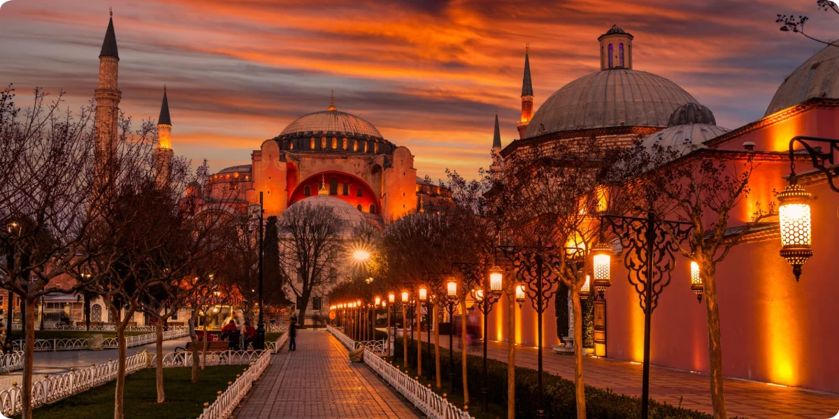 Couple walking near Sultanahmet Square at dusk in Istanbul