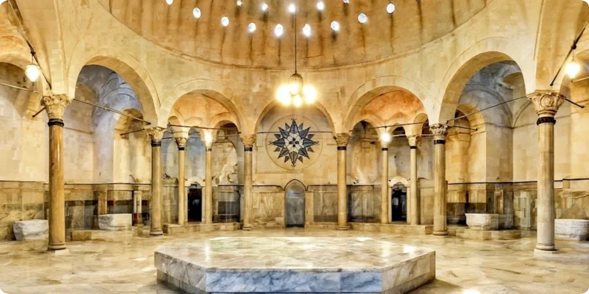 Traditional Turkish hammam interior with marble and warm light in Istanbul