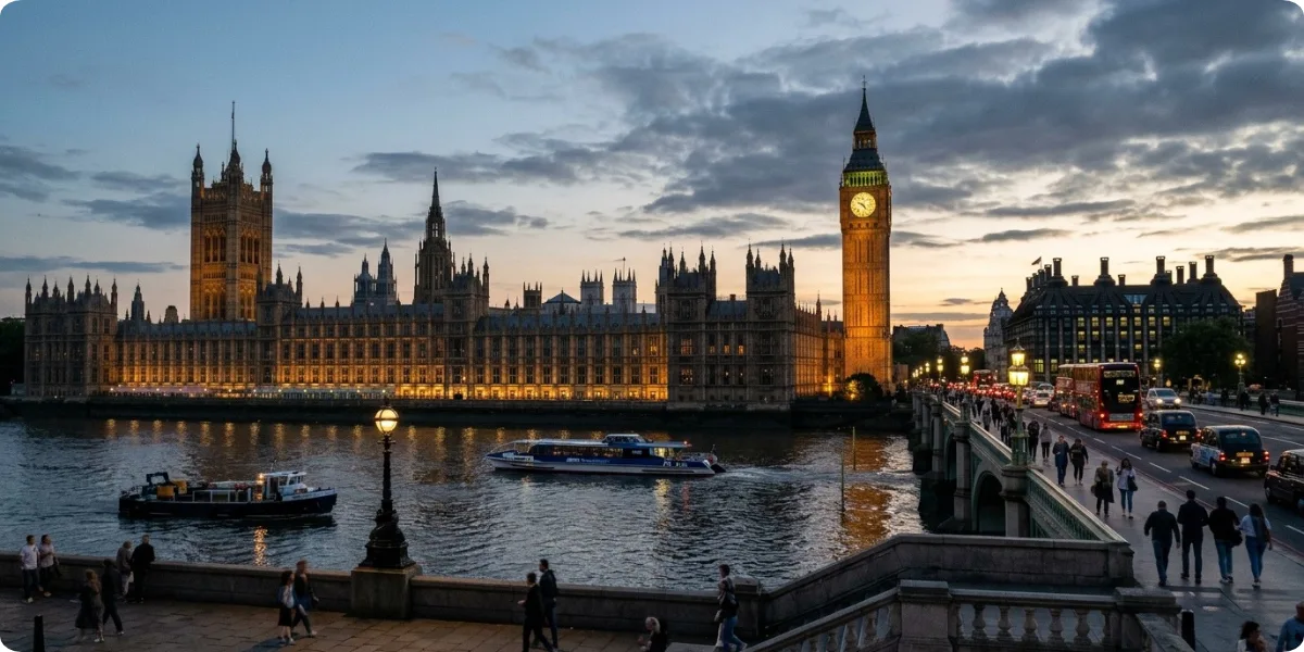 London landmarks lit up at night along the Thames