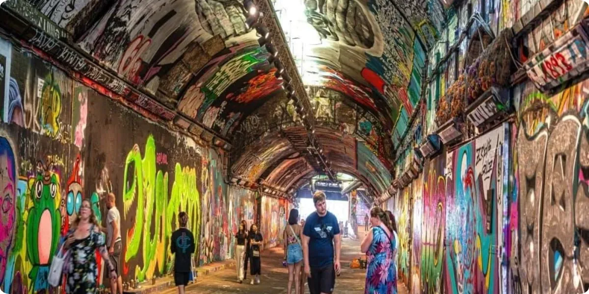 Colorful graffiti and street art inside Leake Street Arches London