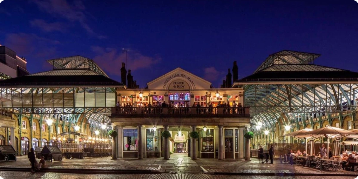 Covent Garden piazza illuminated in the evening in London
