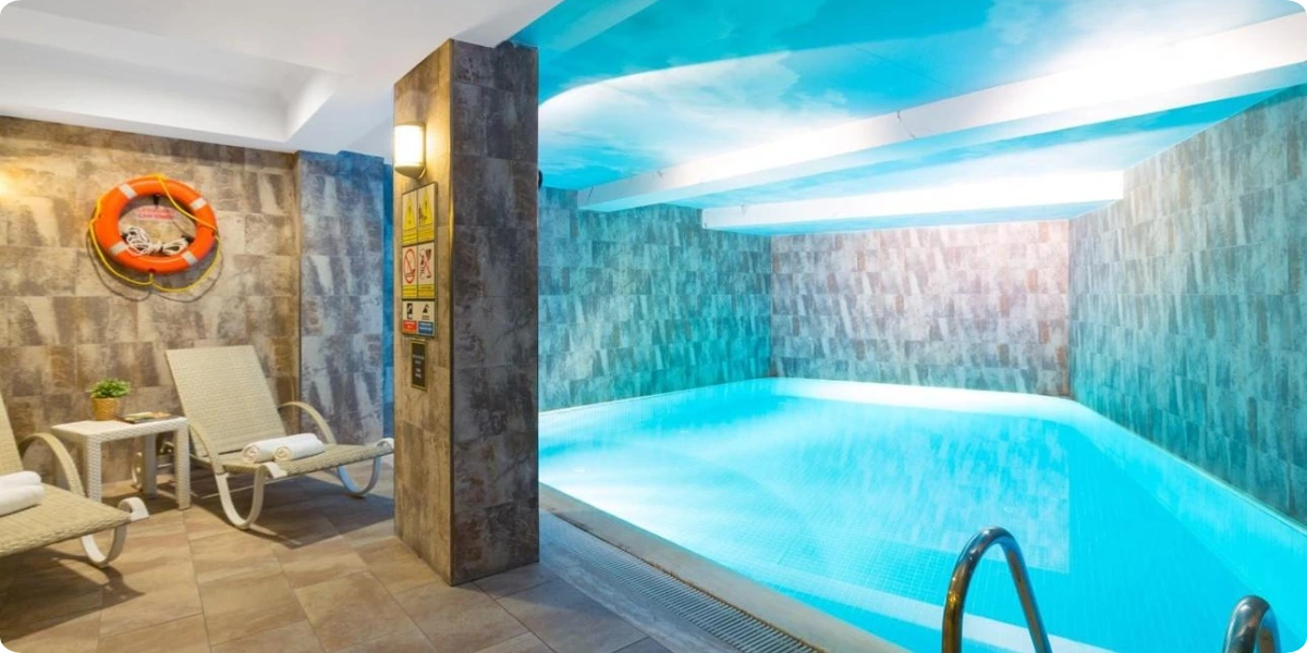 Indoor swimming pool at Sirkeci Mansion family hotel in Istanbul