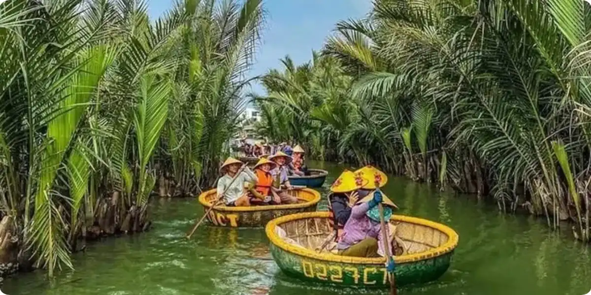 Traditional bamboo basket boat ride through Cam Thanh coconut forest near Hoi An