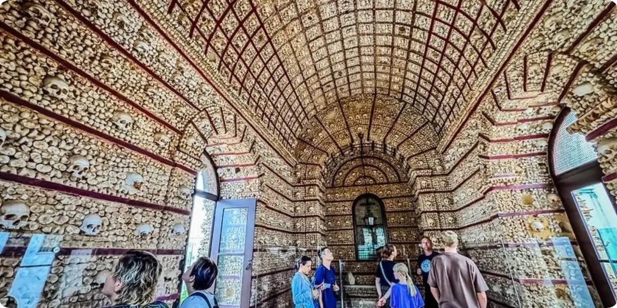 About 10–15 minutes’ walk from the walls, Igreja do Carmo has gilded Baroque altars.